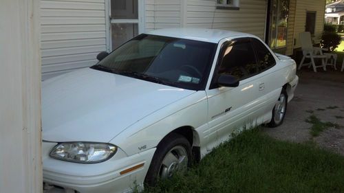 White two door fully loaded 90000 miles