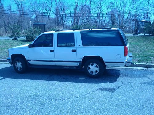 1993 gmc suburban white in color for sale. very reliable vehicle