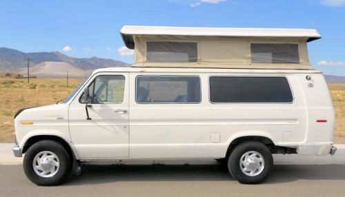 Ford e350 supervan with sportmobile penthouse roof