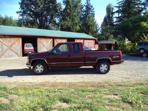 1998 chevrolet silverado 4wd ext cab 3rd door,rust free,adult owned,nice clean