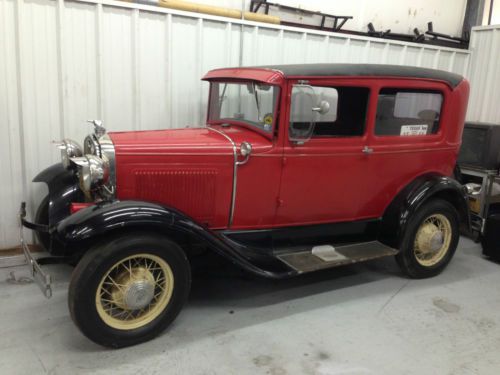 1930 model a ford 2 door sedan stock motor good condition belongs to aj foyt