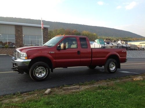 2003 ford f250 xlt ext cab 4wd only 116kmiles.  w/2005 myers snow plow