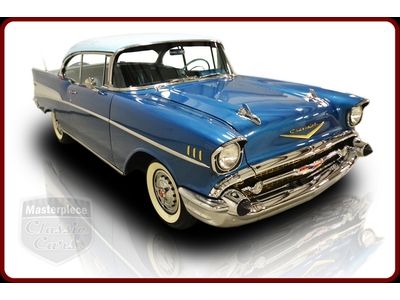 57 chevrolet bel air coupe  rebuilt 283 v8 three speed on the tree manual