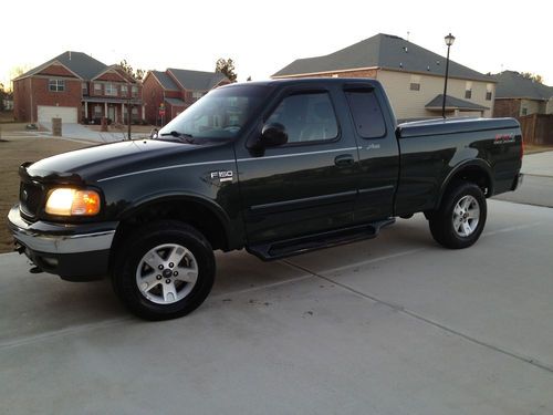 Ford f-150 lariat 4x4, 1 owner, 100k miles, pure muscle, lifted, the works!