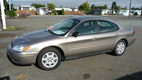 2006 ford taurus ls, 4 door, auto, remote, a/c, disc, (see pictures)