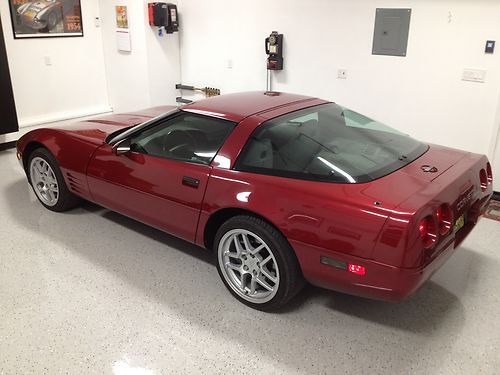 1994 corvette, 6-speed manual, dark red metallic/gray, sharp