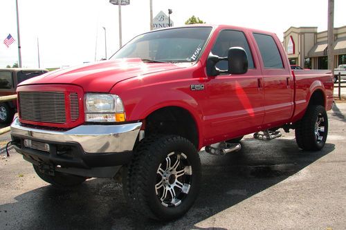 2003 ford f250 super duty lariat~turbo diesel~4x4~crew cab~red~new tires~lifted!