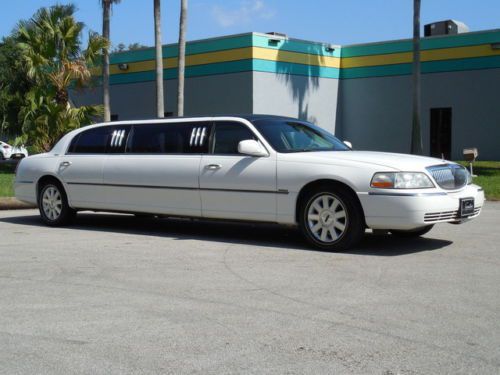 2003 lincoln town car 70&#039; royal strecth limousine , white with tuxedo black top