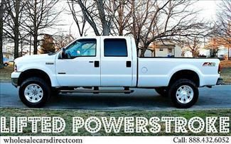 Used lifted ford f 250 powerstroke turbo diesel 4x4 pickup trucks crew cab 4dr