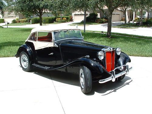 1953 mg td black &amp; tan with red interior